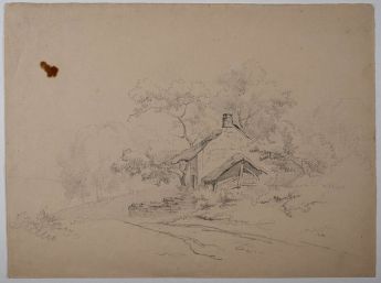 Häuschen umgeben von Bäumen