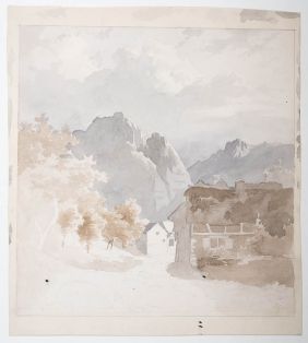 Wald und Häuser am Fuß des Gebirges